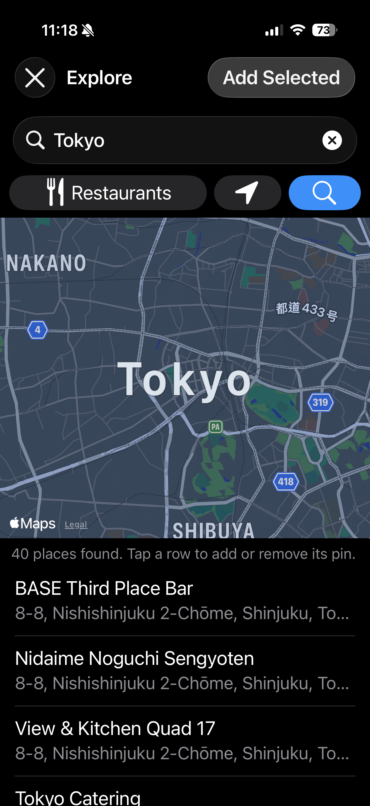 Apple Maps discovery screen searching restaurants around Tokyo